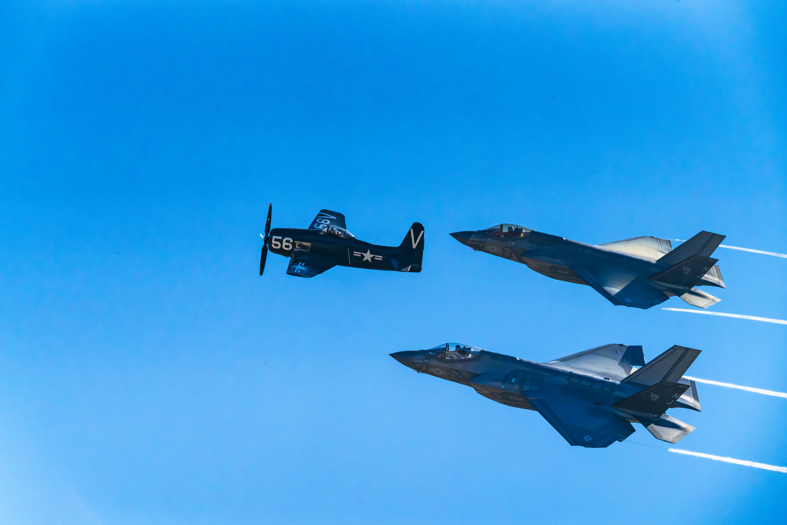Two F35 Lightning II and Navy Grumman F8 Bearcat: US Navy Legacy Flight demonstration